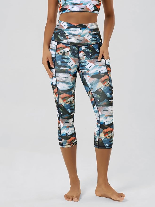 ODODOS Women's High Waisted Yoga Capris with Pockets, Tummy Control Non See Through Workout Athletic Running Capri Leggings