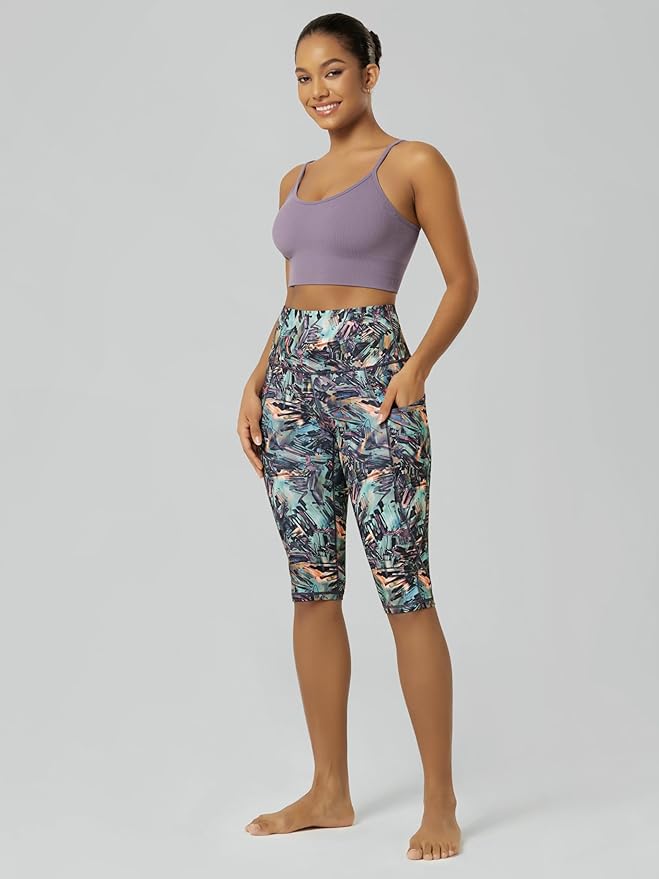 ODODOS Women's High Waisted Yoga Capris with Pockets, Tummy Control Non See Through Workout Athletic Running Capri Leggings
