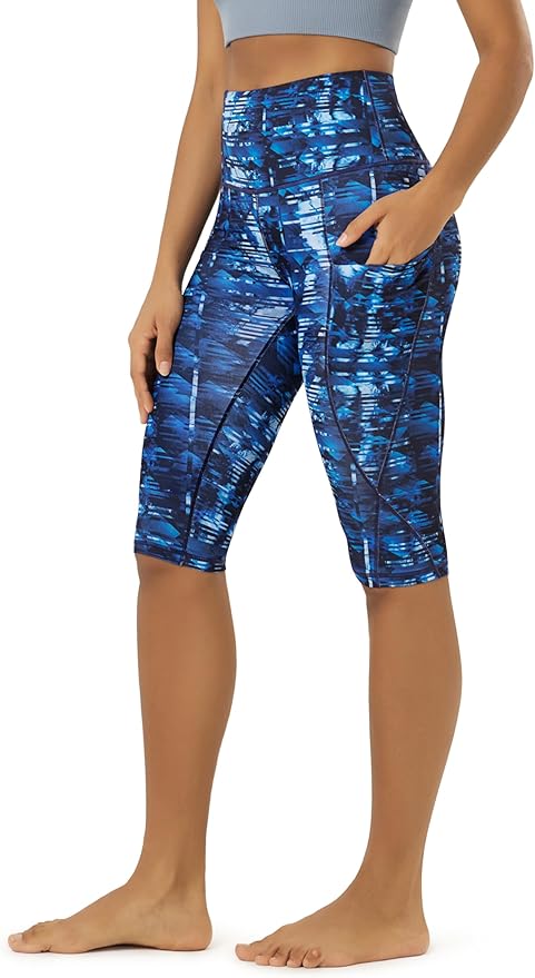 ODODOS Women's High Waisted Yoga Capris with Pockets, Tummy Control Non See Through Workout Athletic Running Capri Leggings