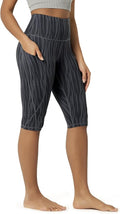 ODODOS Women's High Waisted Yoga Capris with Pockets, Tummy Control Non See Through Workout Athletic Running Capri Leggings
