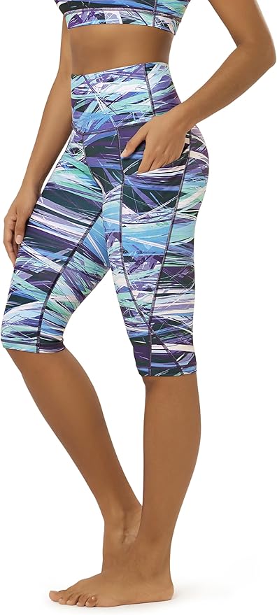 ODODOS Women's High Waisted Yoga Capris with Pockets, Tummy Control Non See Through Workout Athletic Running Capri Leggings