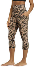ODODOS Women's High Waisted Yoga Capris with Pockets, Tummy Control Non See Through Workout Athletic Running Capri Leggings