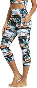 ODODOS Women's High Waisted Yoga Capris with Pockets, Tummy Control Non See Through Workout Athletic Running Capri Leggings