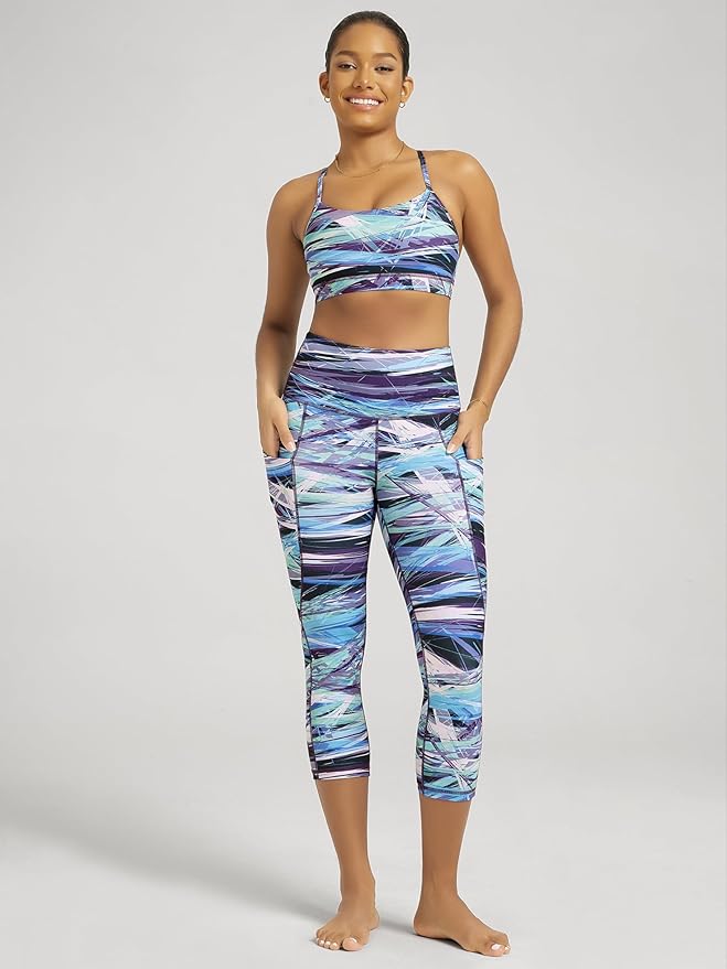 ODODOS Women's High Waisted Yoga Capris with Pockets, Tummy Control Non See Through Workout Athletic Running Capri Leggings