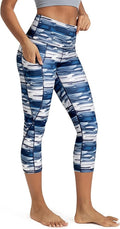 ODODOS Women's High Waisted Yoga Capris with Pockets, Tummy Control Non See Through Workout Athletic Running Capri Leggings