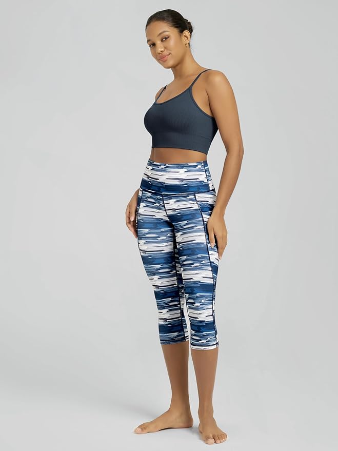 ODODOS Women's High Waisted Yoga Capris with Pockets, Tummy Control Non See Through Workout Athletic Running Capri Leggings