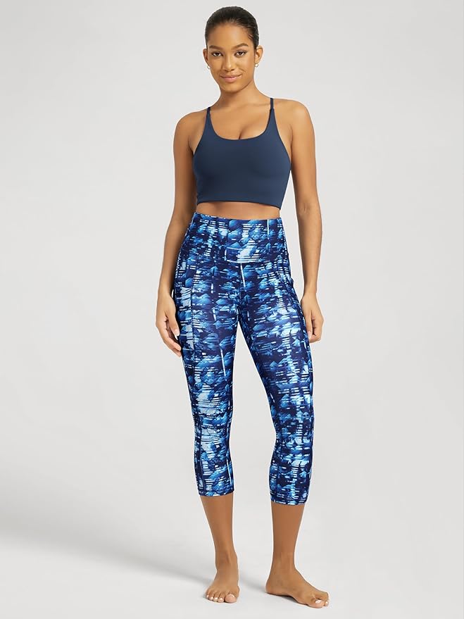 ODODOS Women's High Waisted Yoga Capris with Pockets, Tummy Control Non See Through Workout Athletic Running Capri Leggings
