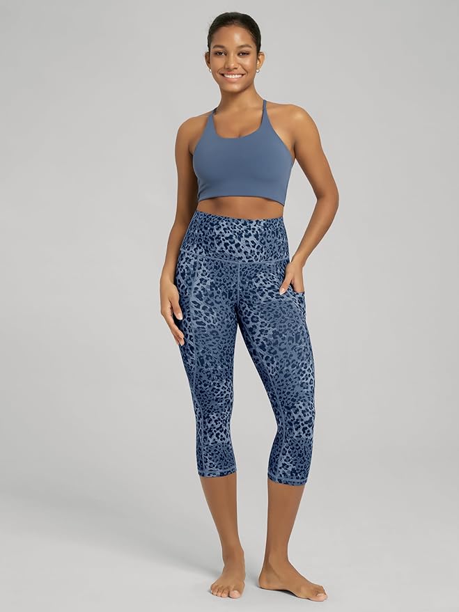 ODODOS Women's High Waisted Yoga Capris with Pockets, Tummy Control Non See Through Workout Athletic Running Capri Leggings