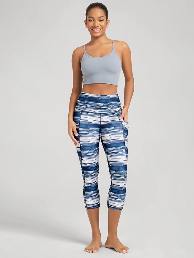 ODODOS Women's High Waisted Yoga Capris with Pockets, Tummy Control Non See Through Workout Athletic Running Capri Leggings