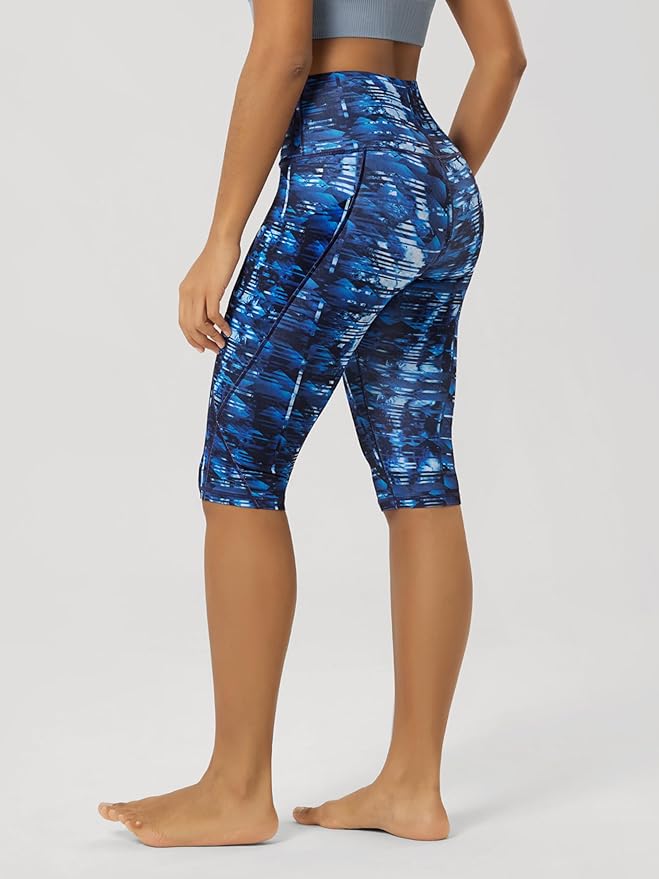 ODODOS Women's High Waisted Yoga Capris with Pockets, Tummy Control Non See Through Workout Athletic Running Capri Leggings