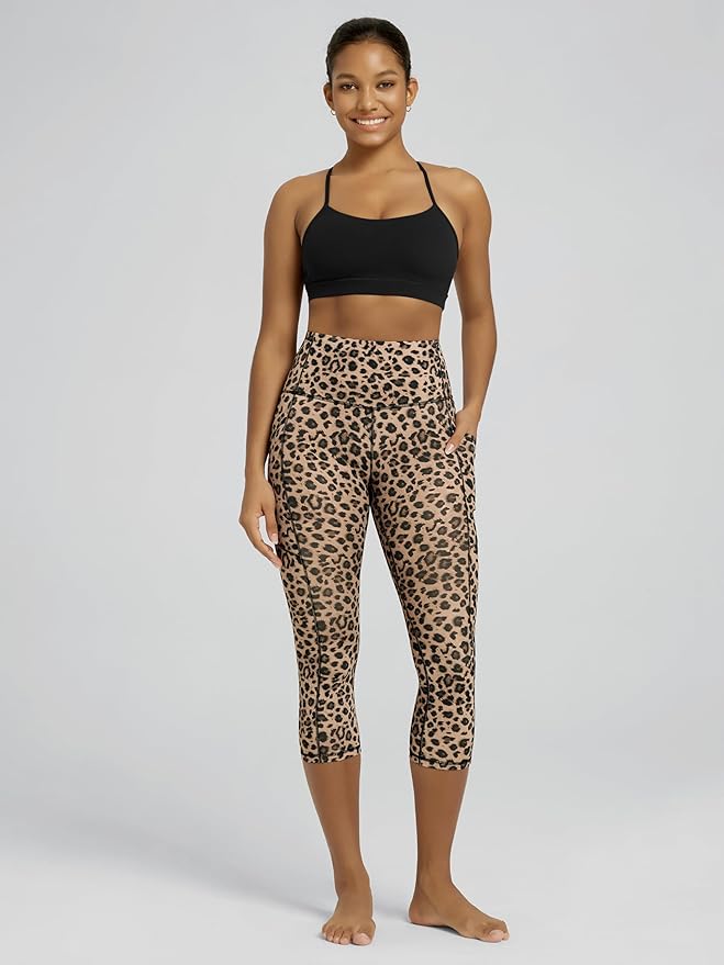 ODODOS Women's High Waisted Yoga Capris with Pockets, Tummy Control Non See Through Workout Athletic Running Capri Leggings