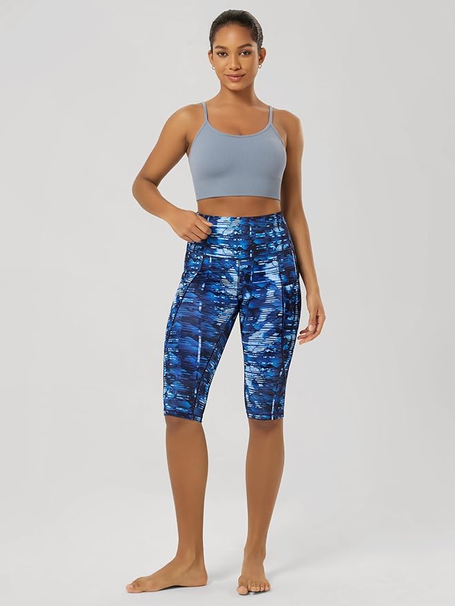ODODOS Women's High Waisted Yoga Capris with Pockets, Tummy Control Non See Through Workout Athletic Running Capri Leggings
