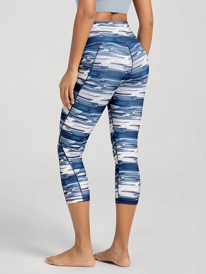 ODODOS Women's High Waisted Yoga Capris with Pockets, Tummy Control Non See Through Workout Athletic Running Capri Leggings