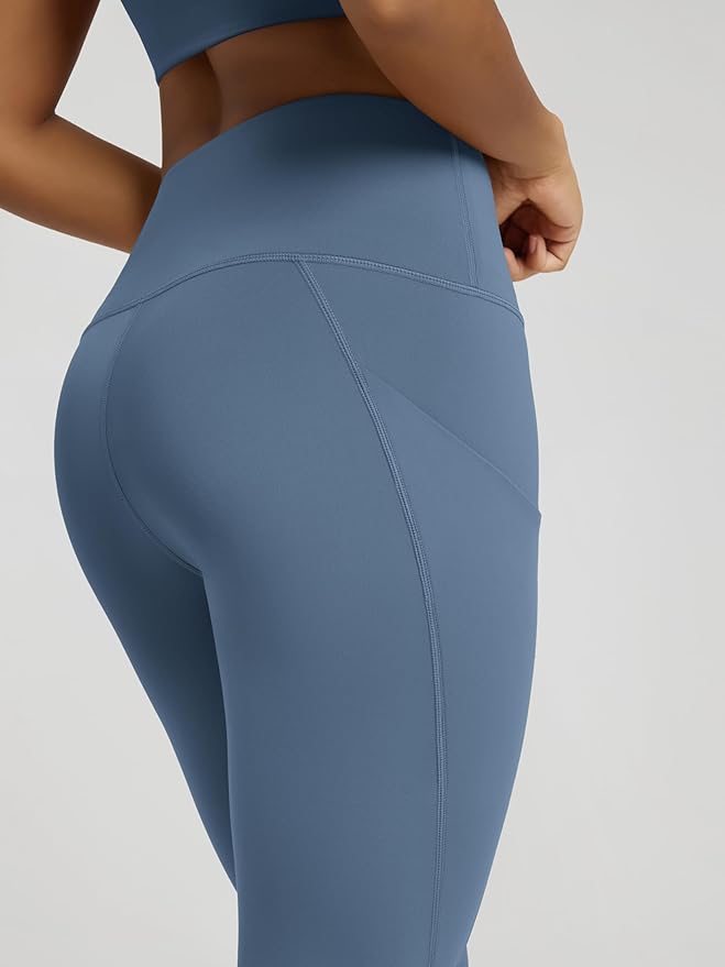 ODODOS Women's High Waisted Yoga Capris with Pockets, Tummy Control Non See Through Workout Athletic Running Capri Leggings
