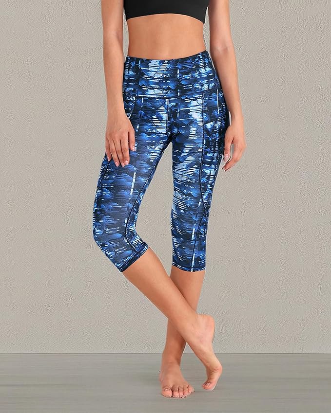 ODODOS Women's High Waisted Yoga Capris with Pockets, Tummy Control Non See Through Workout Athletic Running Capri Leggings