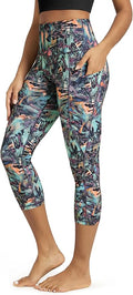 ODODOS Women's High Waisted Yoga Capris with Pockets, Tummy Control Non See Through Workout Athletic Running Capri Leggings
