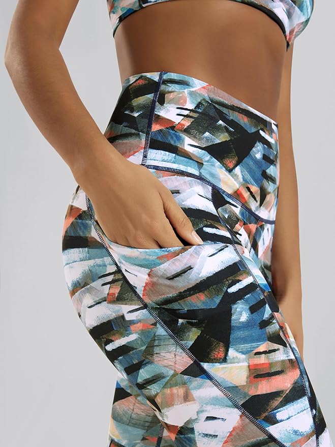 ODODOS Women's High Waisted Yoga Capris with Pockets, Tummy Control Non See Through Workout Athletic Running Capri Leggings