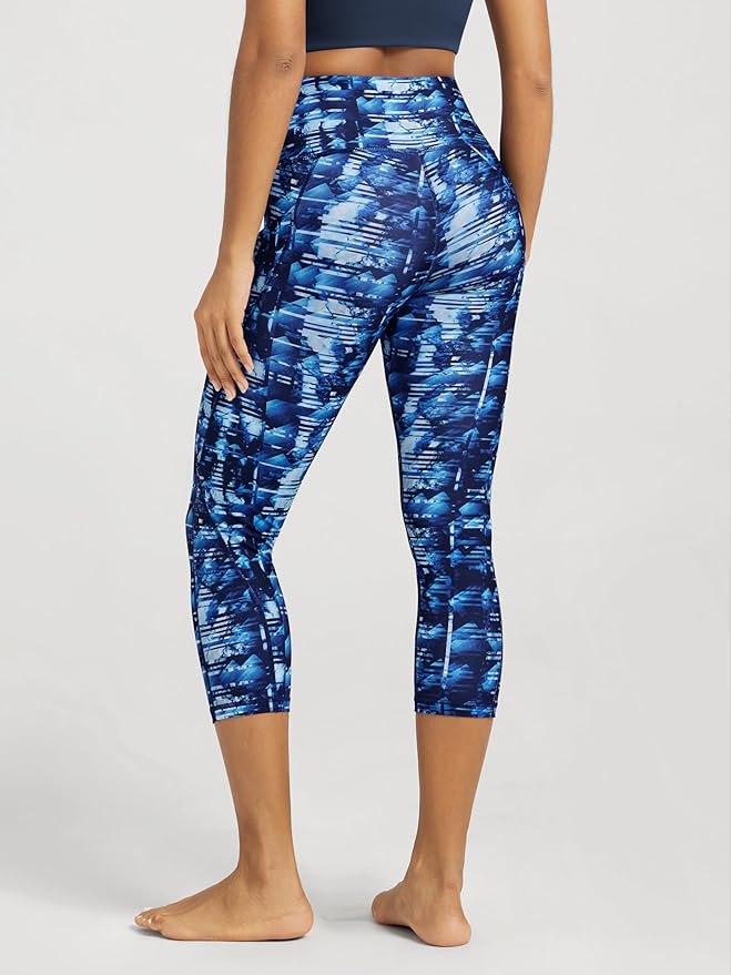 ODODOS Women's High Waisted Yoga Capris with Pockets, Tummy Control Non See Through Workout Athletic Running Capri Leggings