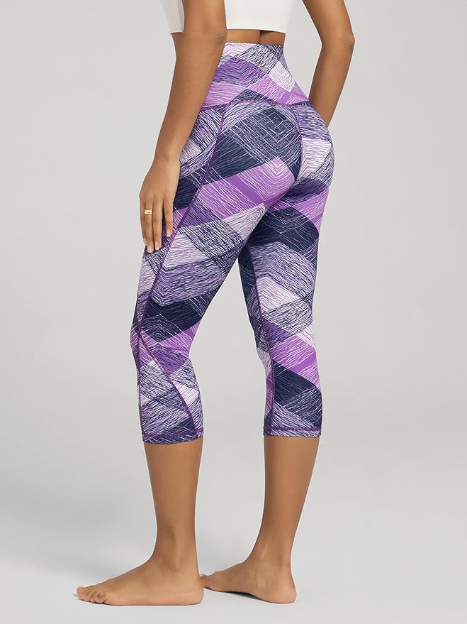 ODODOS Women's High Waisted Yoga Capris with Pockets, Tummy Control Non See Through Workout Athletic Running Capri Leggings