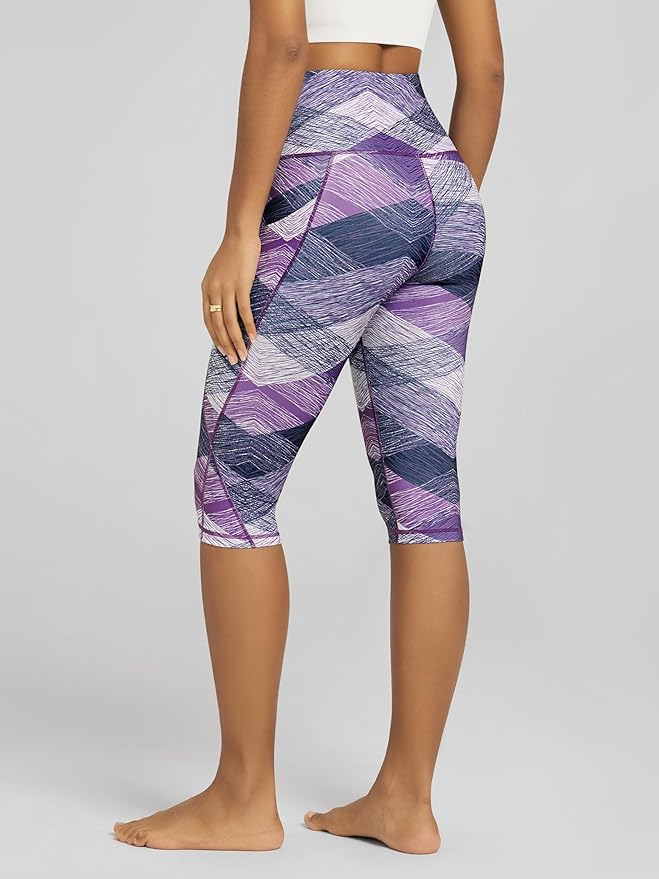 ODODOS Women's High Waisted Yoga Capris with Pockets, Tummy Control Non See Through Workout Athletic Running Capri Leggings