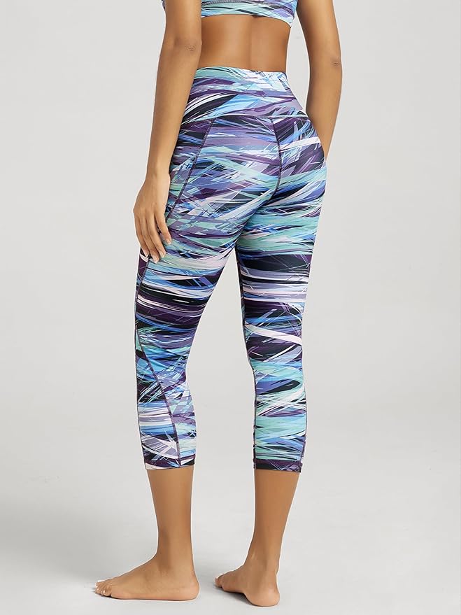 ODODOS Women's High Waisted Yoga Capris with Pockets, Tummy Control Non See Through Workout Athletic Running Capri Leggings